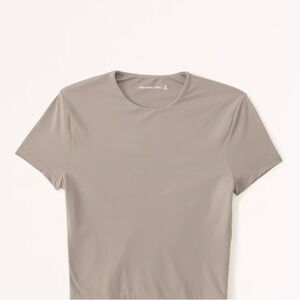Abercrombie Soft Matte Seamless Tuckable Baby Tee in Taupe
